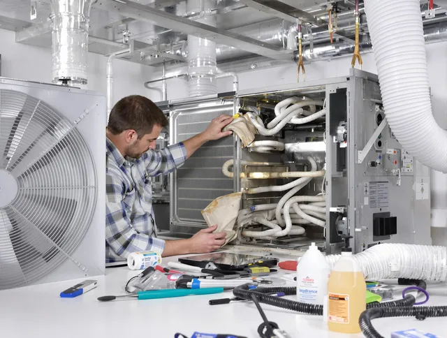Westport Air Duct Cleaning specialist performing precision AC coil cleaning in Westport