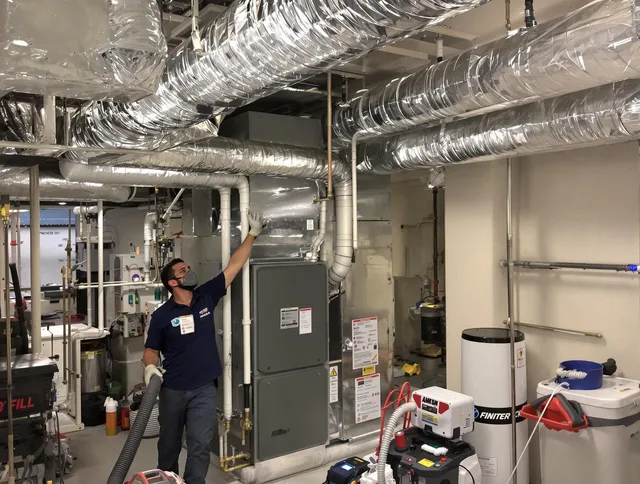Westport Air Duct Cleaning specialist performing thorough furnace duct cleaning in a Westport residence
