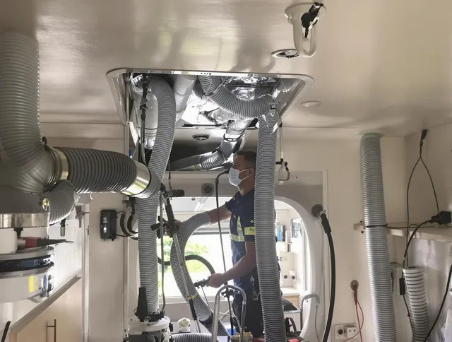 Westport Air Duct Cleaning specialist performing precise mobile home duct cleaning in Westport